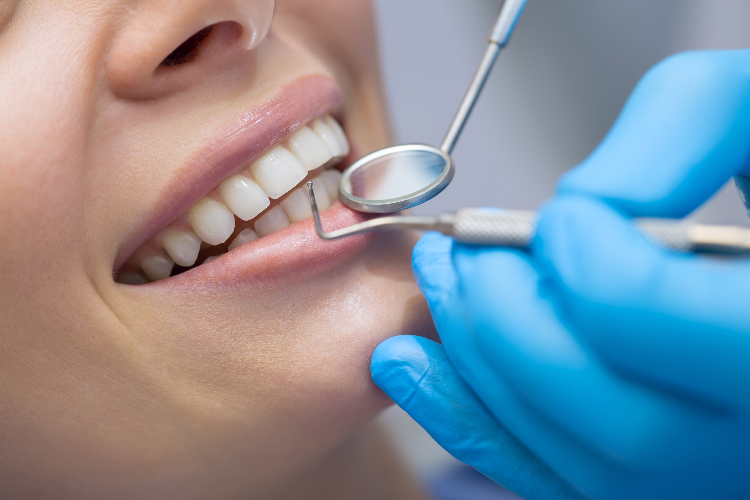 Dentist examining a patient's teeth in the dentist.